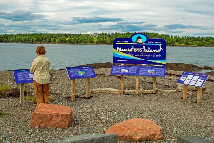 Tide charts and panels describing Minister's Island, New Brunswick