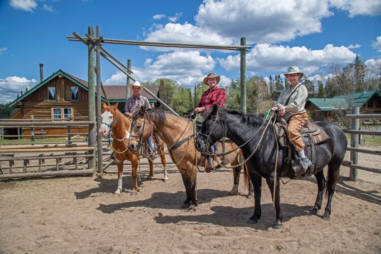 Trail riders saddled up for UFO trail ride, Falcon Beach Ranch, Manitoba