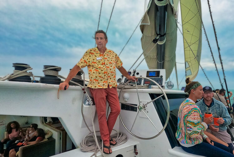 Captain Emyl at the helm of the SV Argo Navis, Florida Keys