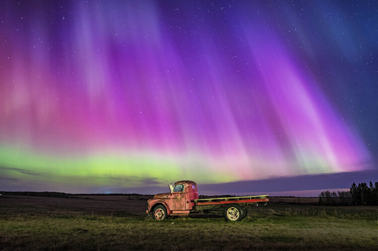 Northern lights and old truck, Saskatchewan, Canada