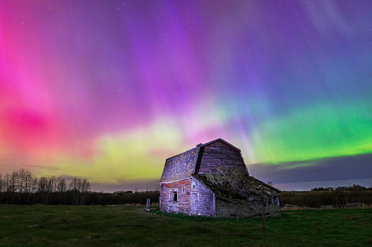 Old barn against northern lights, Saskatchewan