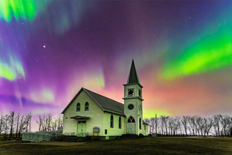 Northern lights over Pleasant Point Church near Saskatoon, Saskatchewan.