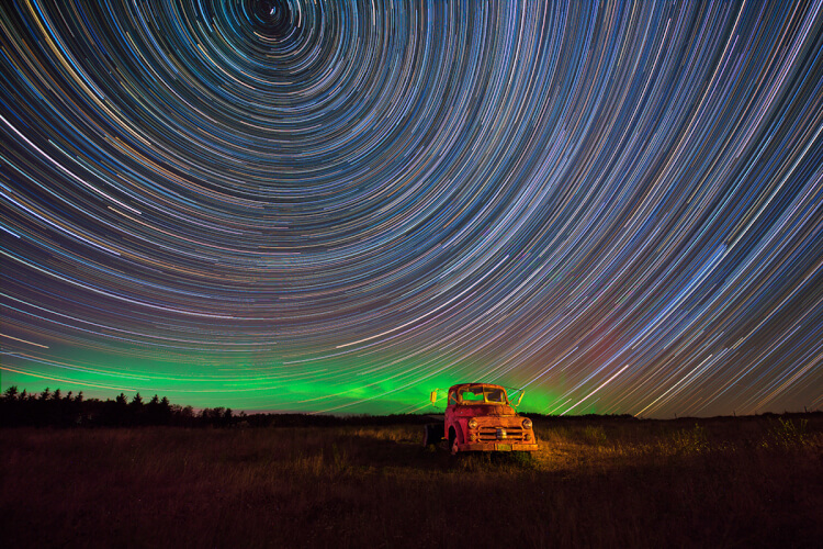 Star trails with old truck