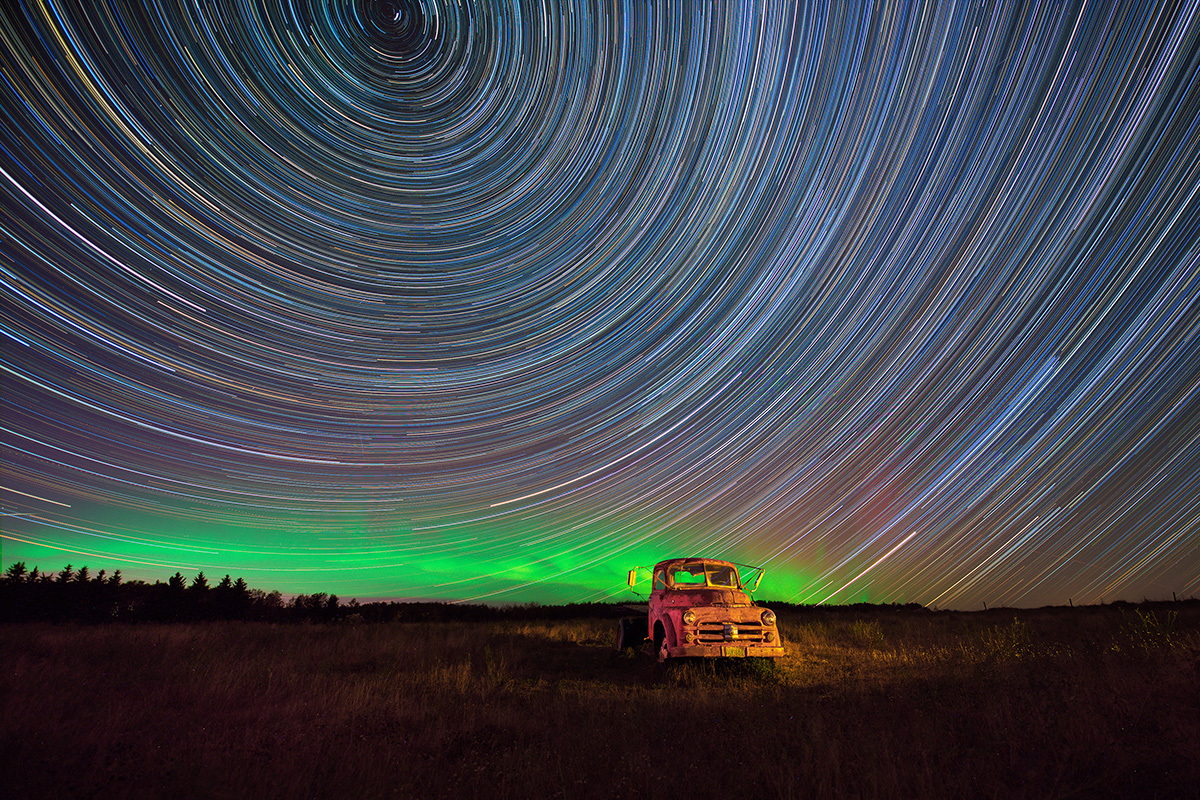 Star trails over old truck, Saskatchewan. Winner Gold Award 2026 Bill Muster Photography Award