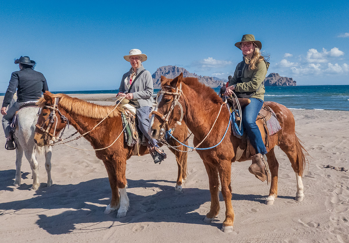 Horseback riding on beach near Loreto, Mexico.