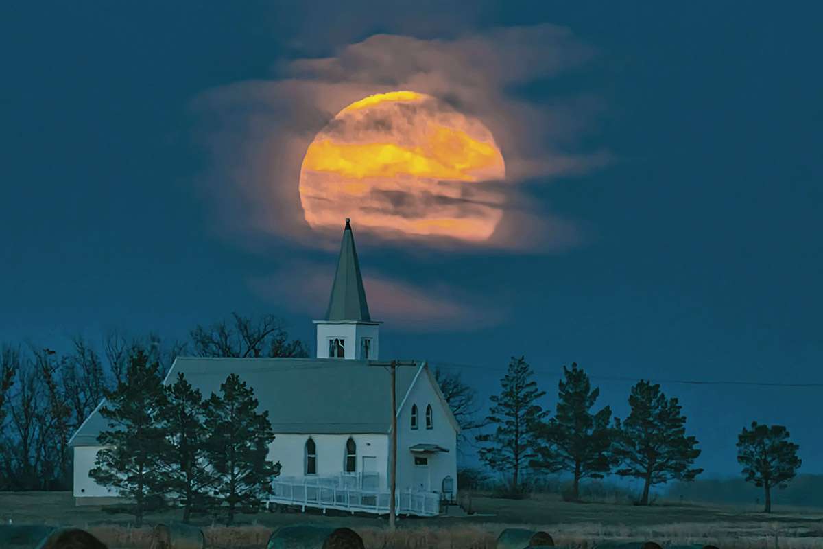 Cloudy moonrise, Saskatchewan.