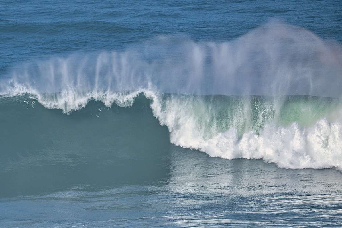 Waves along the shoreline of Algarve coast, Portugal