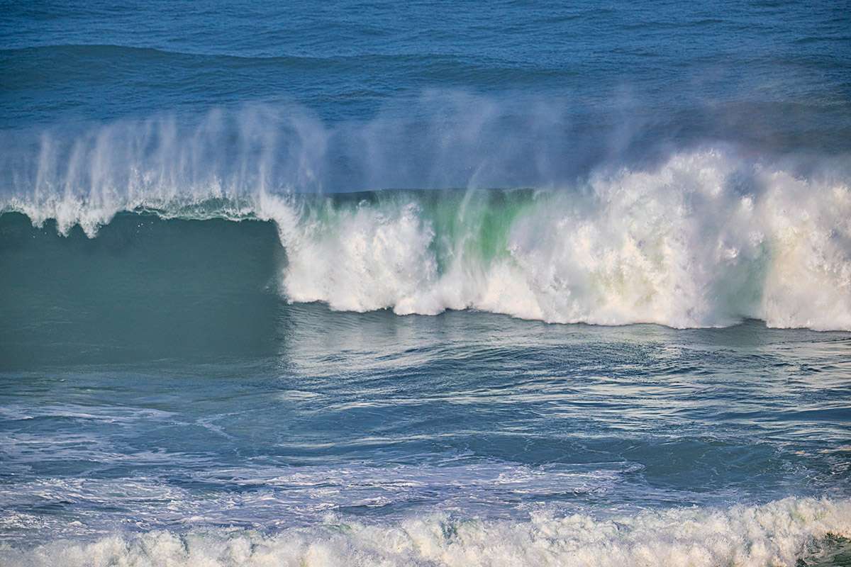 Wild waves along the Algarve coast of southern Portugal. 